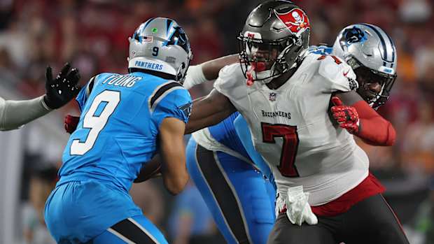 Tampa Bay Buccaneers linebacker Shaquil Barrett pressures Carolina Panthers quarterback Bryce Young on Dec. 3, 2023.